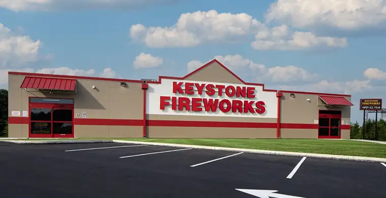 Keystone Harrisburg storefront with its red sign and front parking lot